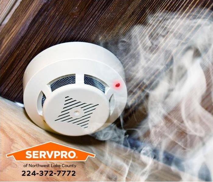 Smoke alerts a smoke detector in a home.