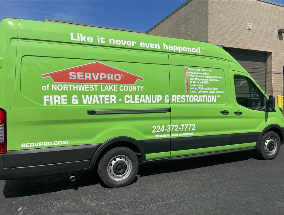Locally Owned and Operated - image of green SERVPRO van