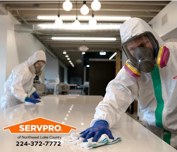 A team of SERVPRO technicians decontaminates a building exposed to COVID-19.