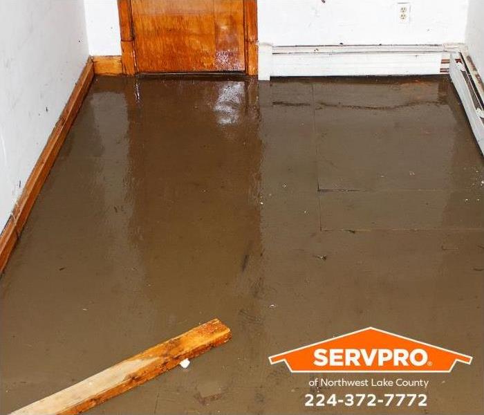 A floor in a home is saturated with water.